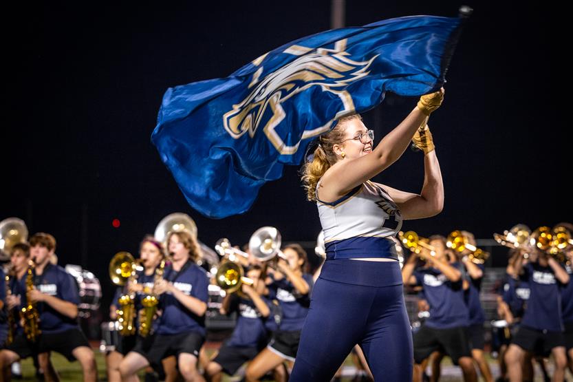Students perform on football field